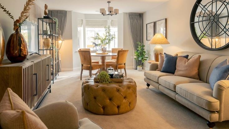 a living room with a round table