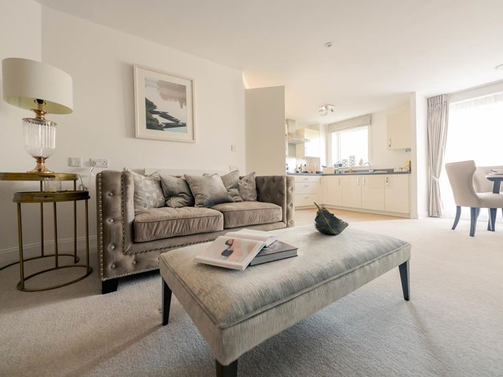 a living room with a couch and a coffee table