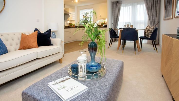 a living room with a couch and a coffee table