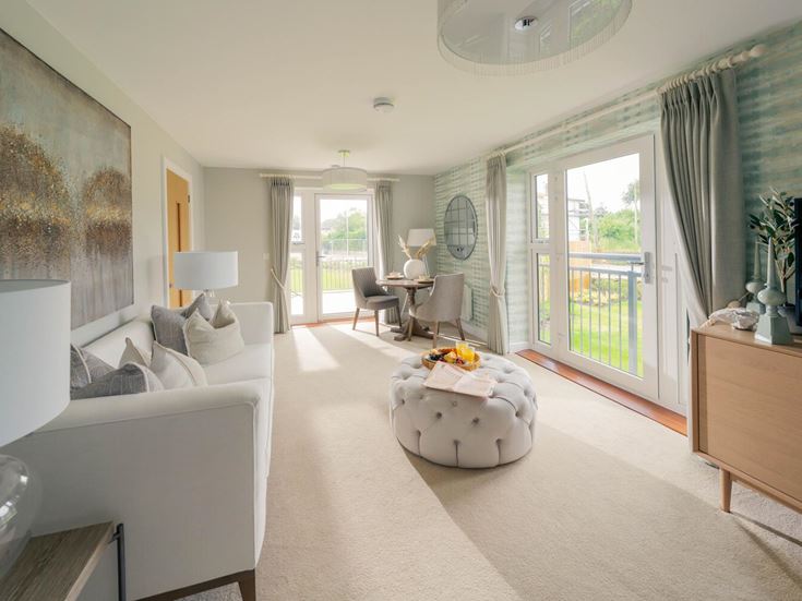 a living room with a large glass door