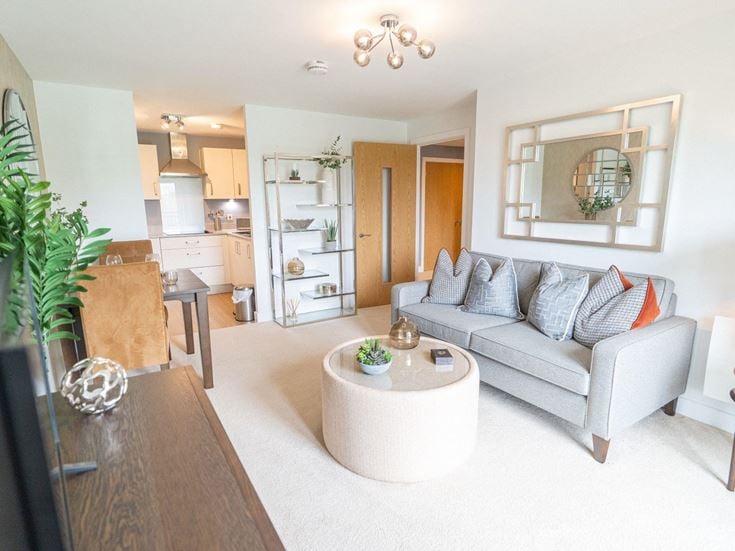 a living room with a couch and a table