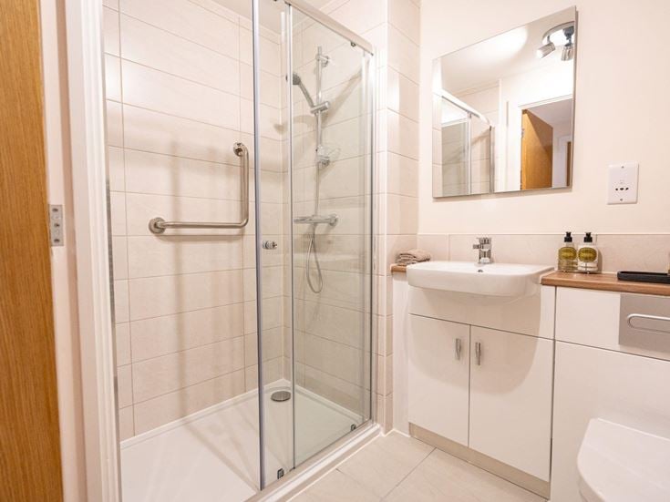 a bathroom with a glass shower
