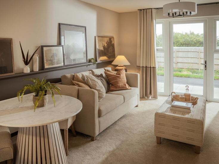 a living room with a couch and coffee table