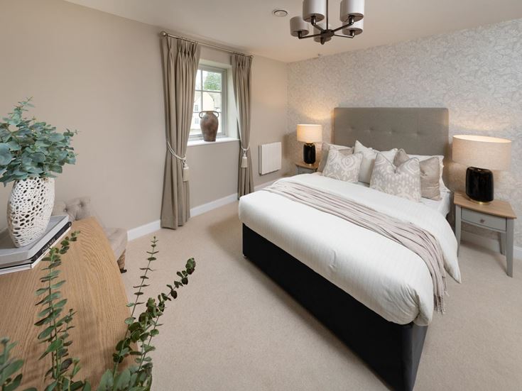 a bedroom with a large bed