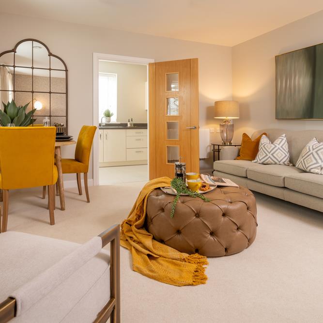 a living room with a couch and a table