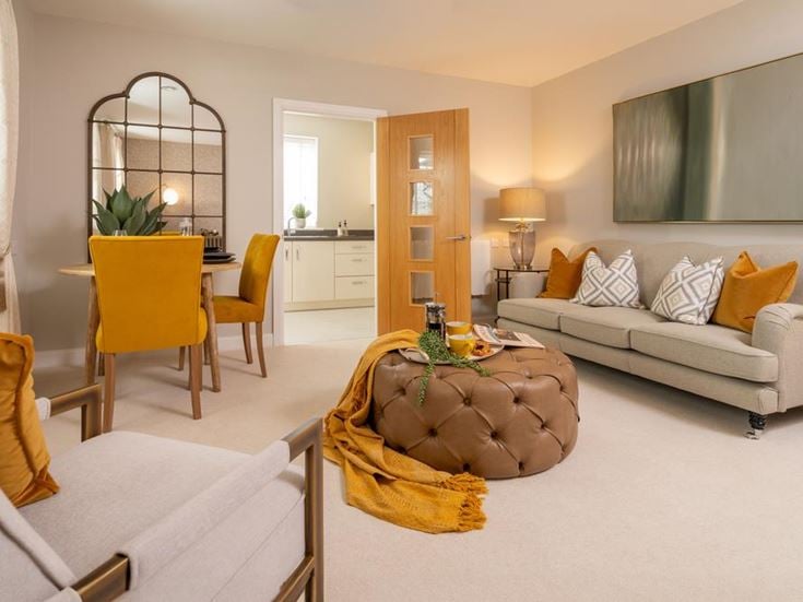 a living room with a couch and a table