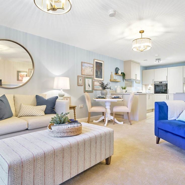 a living room with a couch and a table