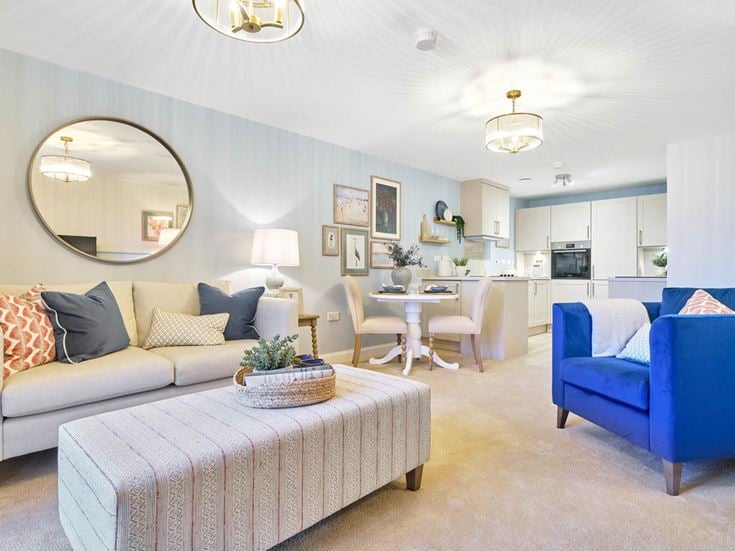 a living room with a couch and a table