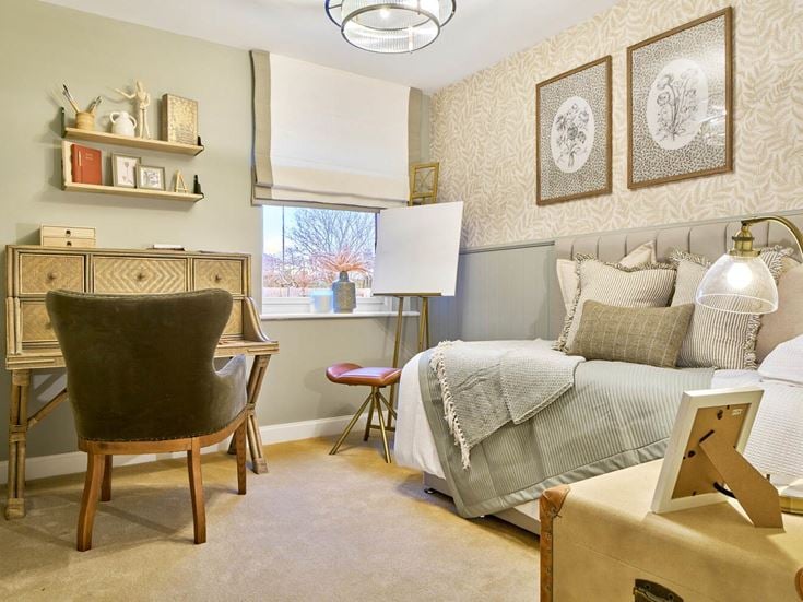 a room with a bed and a chair