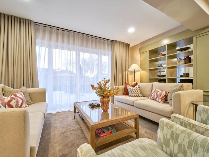 a living room with a couch and a coffee table