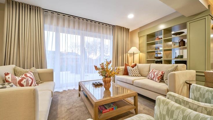 a living room with a couch and a coffee table