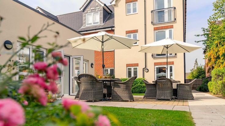 a house with a patio and chairs