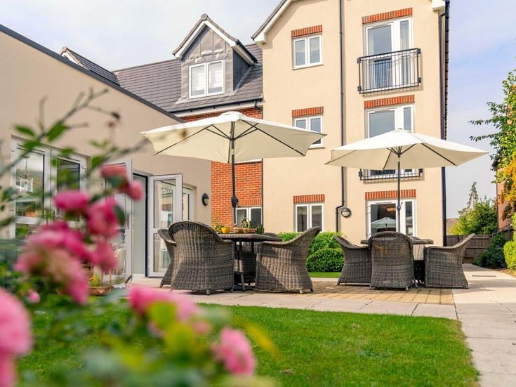 a house with a patio and chairs