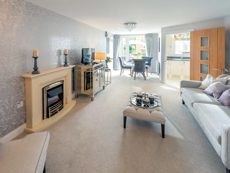 a living room with a fireplace
