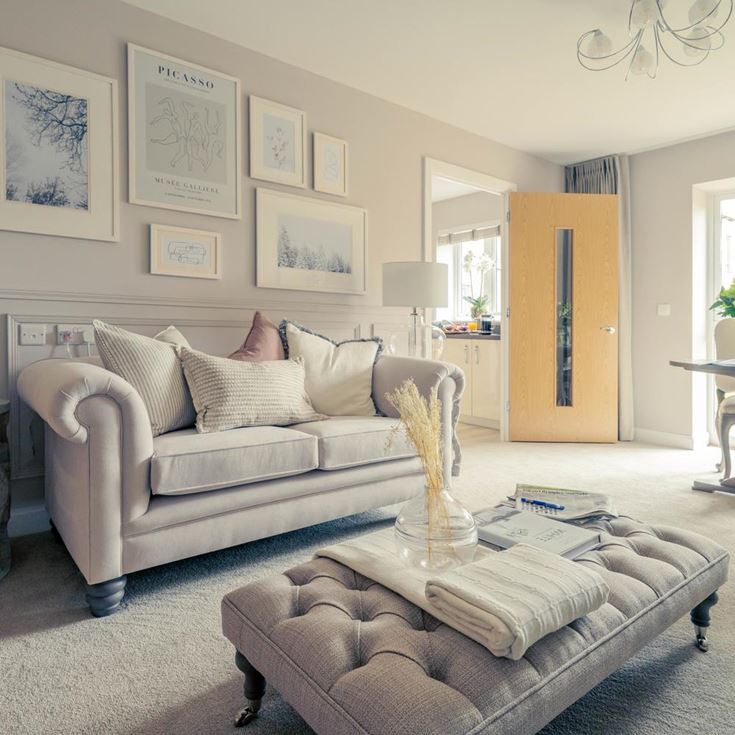 a living room with a couch and a table