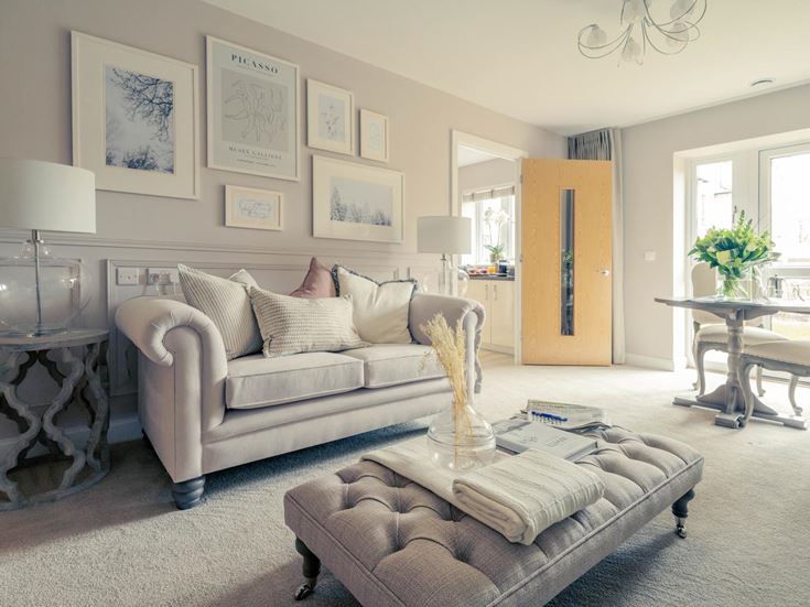 a living room with a couch and a table