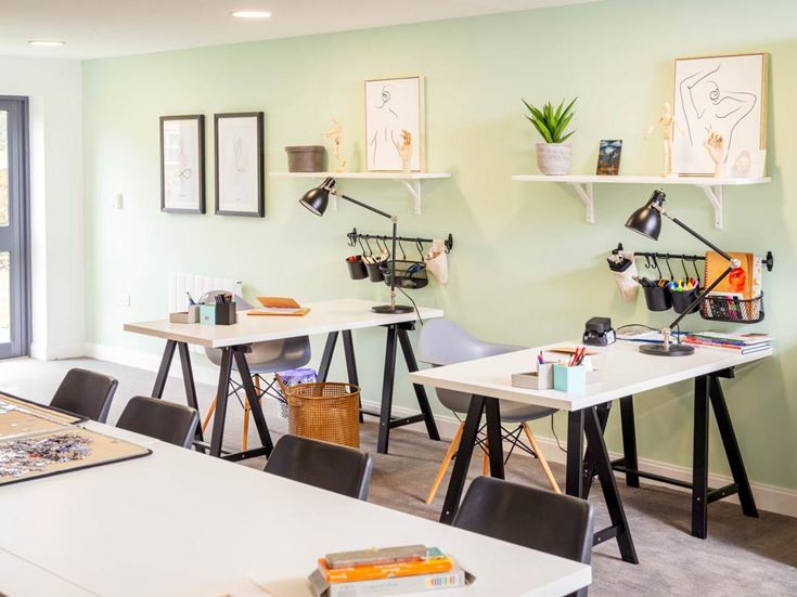 a room with tables and chairs