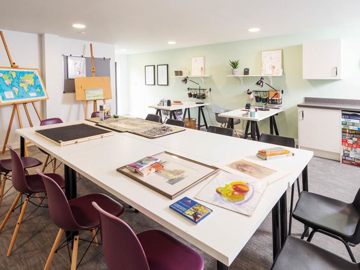 a room with tables and chairs