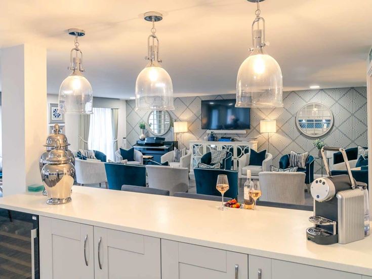 a kitchen with white cabinets