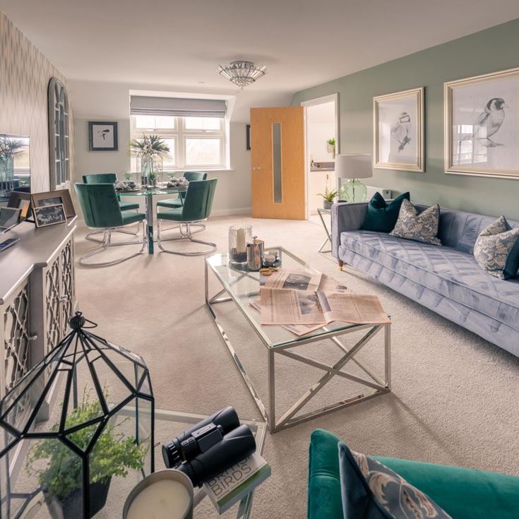 a living room with a couch and a table