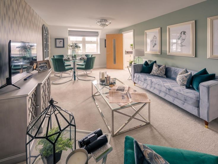 a living room with a couch and a table
