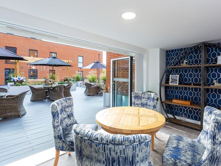a room with chairs and tables