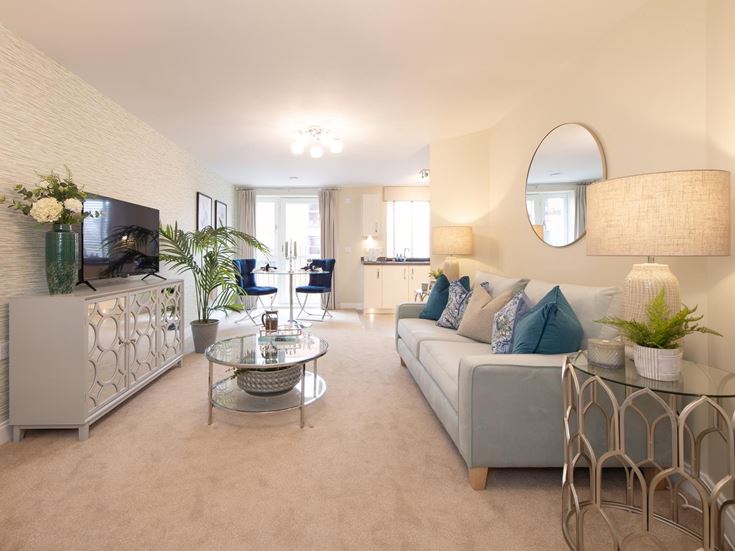 a living room with a couch and a table