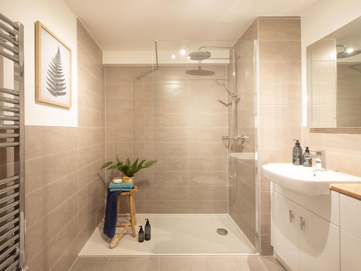 a bathroom with a glass shower