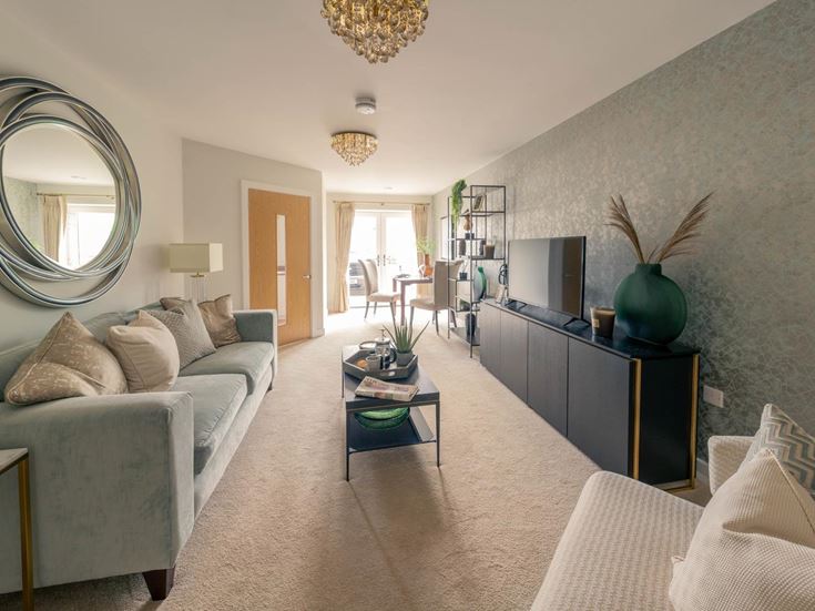 a living room with a large mirror
