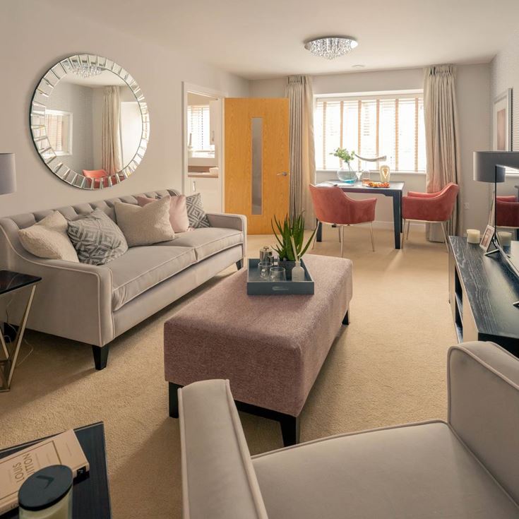 a living room with a large mirror