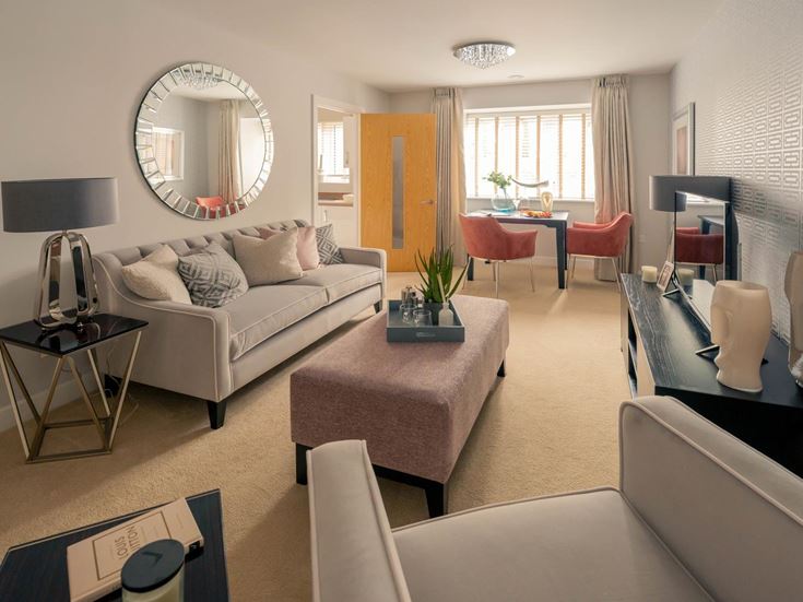 a living room with a large mirror