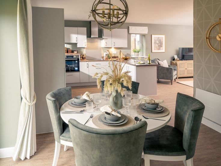 a dining room table with chairs