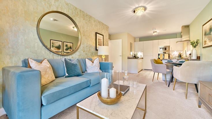 a living room with a blue couch