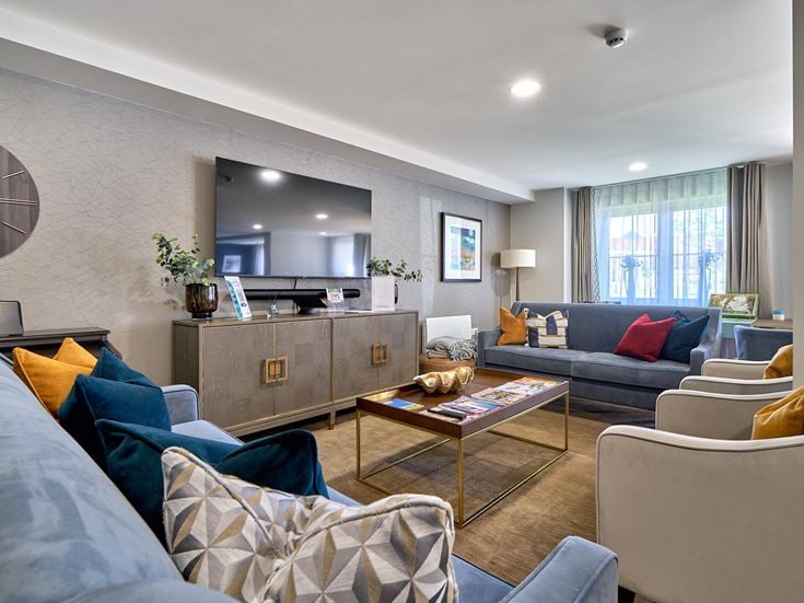 a living room with a large mirror