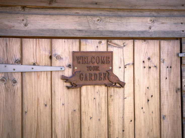 a wooden door with a sign on it