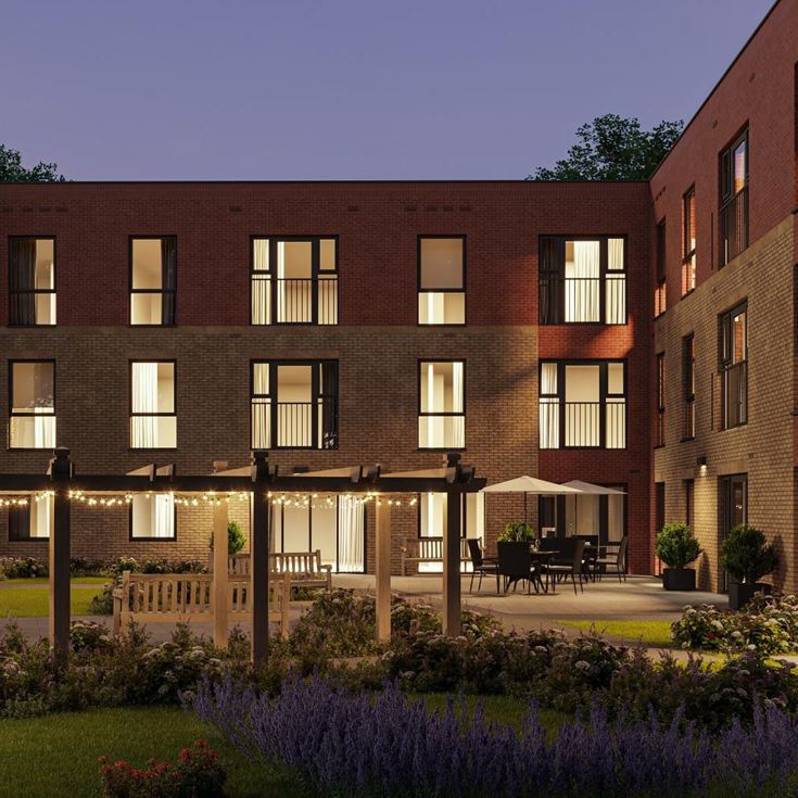 a building with a garden in front