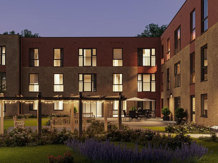 a building with a garden in front