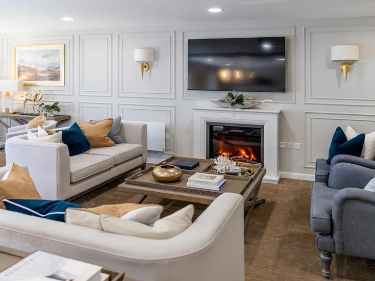 a living room with a fireplace