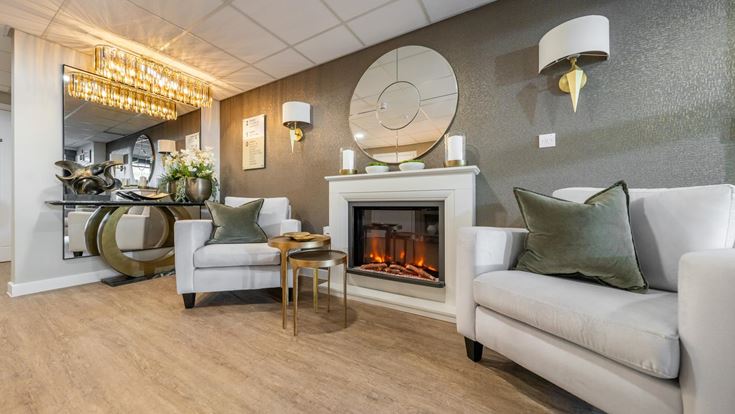 a living room with a fireplace