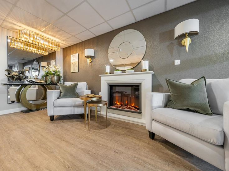 a living room with a fireplace