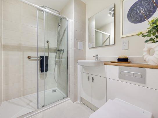 a bathroom with a glass shower