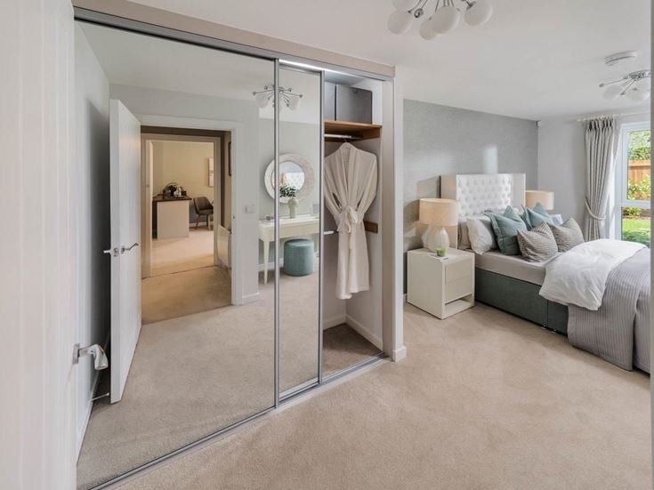a bedroom with a glass door