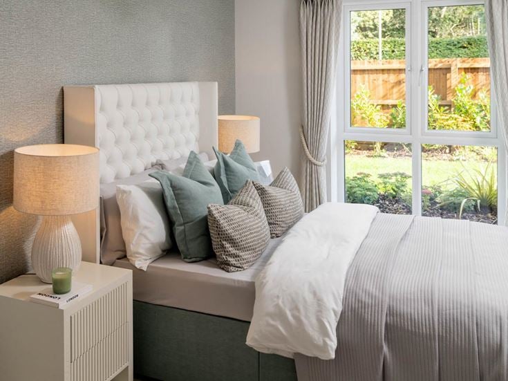 a bed with white pillows