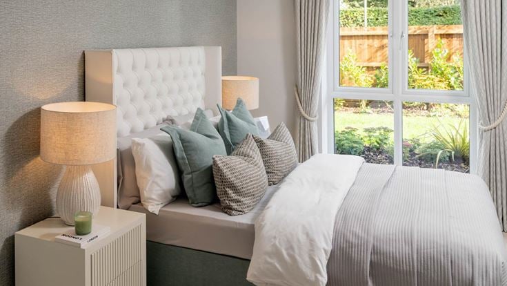 a bed with white pillows