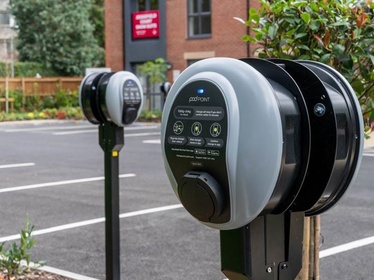 a parking meter on the side of the road