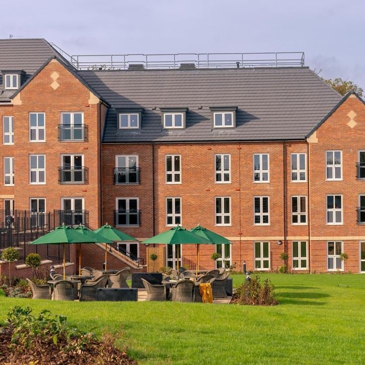 a building with a lawn in front of it