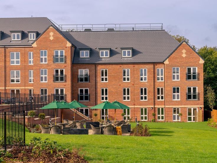 a building with a lawn in front of it