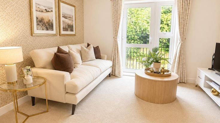a living room with a couch and a coffee table