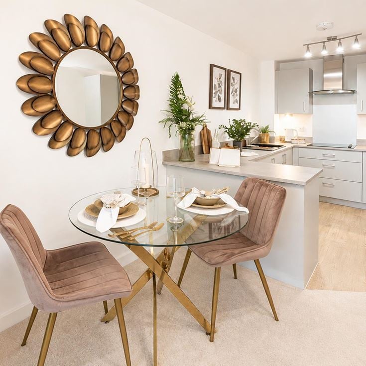 a dining room table with chairs