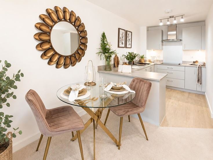 a dining room table with chairs